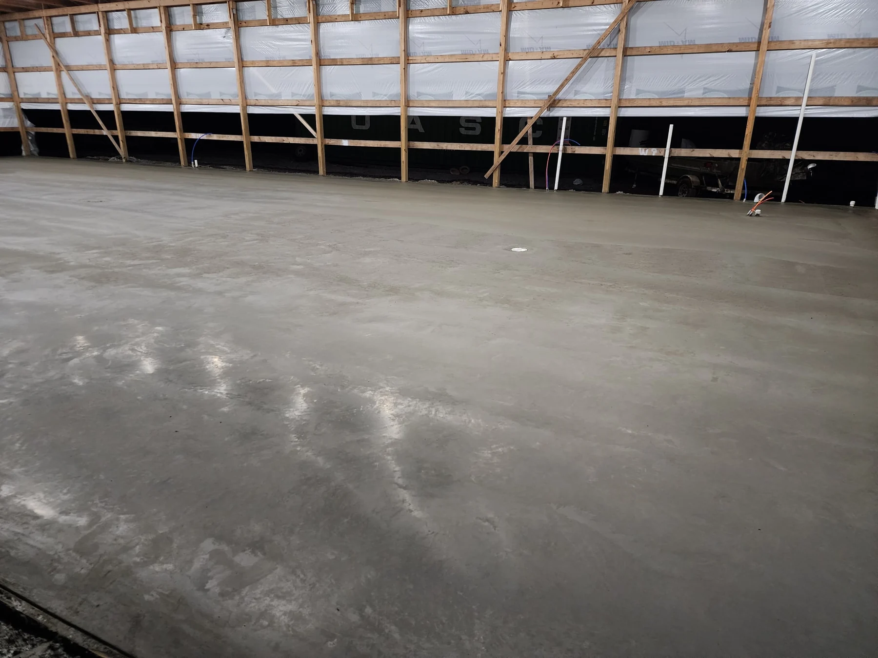 Concrete shop floor inside a Bontrager post-frame building