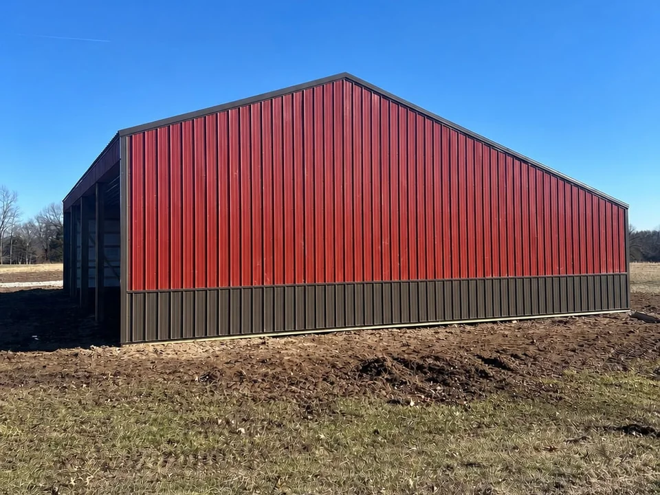 Red ribbed metal siding on a Bontrager agricultural building