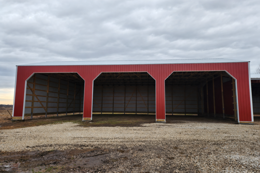 Project photo: Red Three-Bay Pole Shed Addition in Lewistown, Missouri