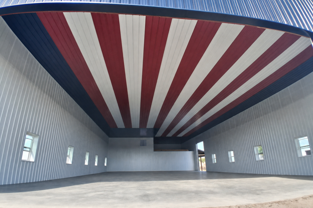 American flag ceiling above the lined interior and concrete floor — edited project photograph
